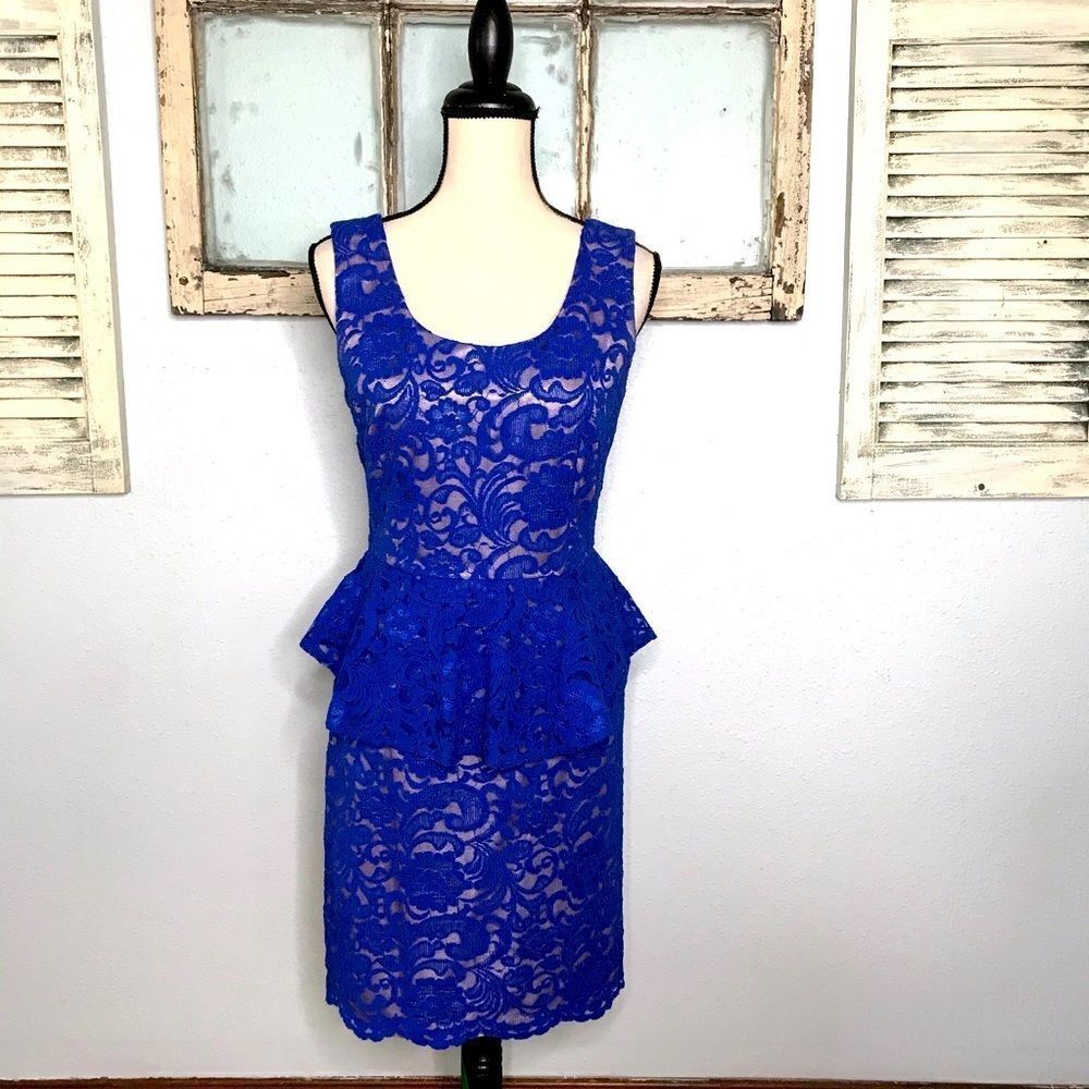 Beautiful Lace Peplum Dress by Explosion